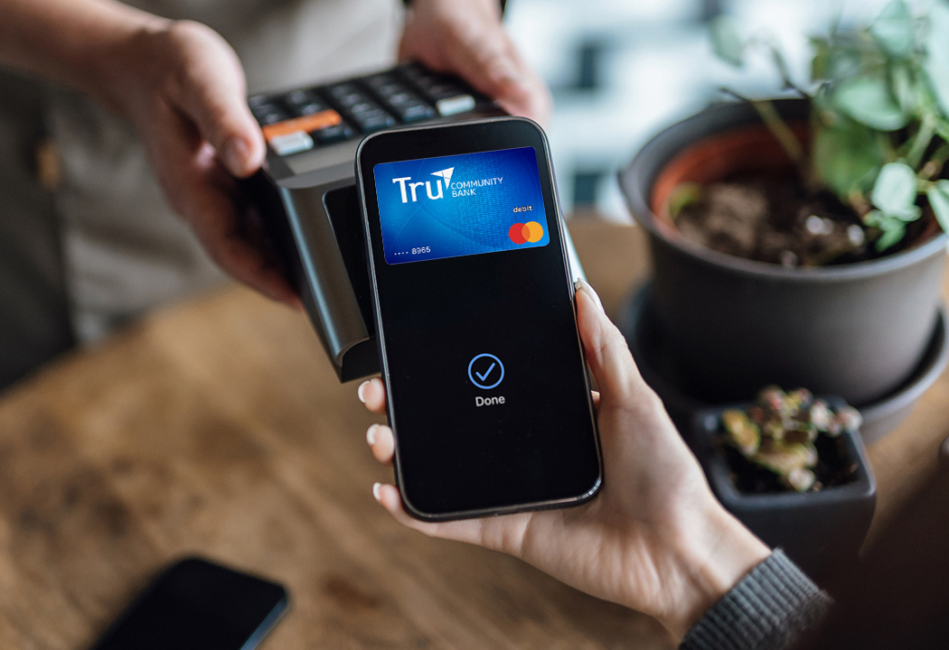 Person paying with their digital wallet.